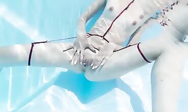 French Brunette Gets Off with Aquatic Anal Fingering