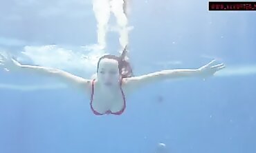 Brunette Goddess Mia Ferrari Shows Off Huge Boobs in Pool Bikini