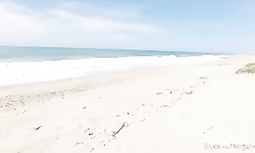 Skinny Brunette Enjoys Public Nudity At The Beach