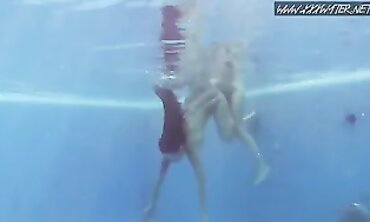 Brunette Beauties Dive Into the Pool for a Lesbian Swim