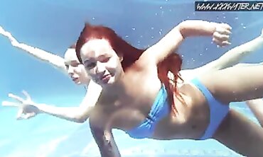 Brunette Beauties Dive Into the Pool for a Lesbian Swim