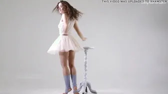 Curly-Haired Gymnast Ursula Fe Flexes and Spreads Her Legs
