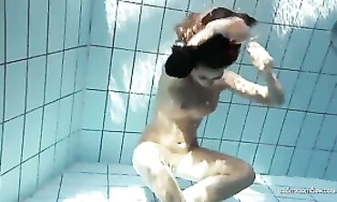 Anna Tatu Swims Nude in the Pool