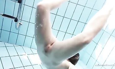 Anna Tatu Swims Nude in the Pool