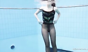 Anna Tatu Swims Nude in the Pool