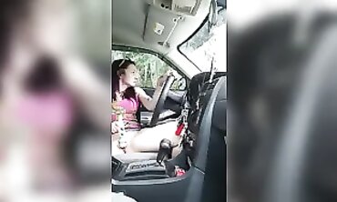 Petite Redhead Masturbates Through Car Window At The Park