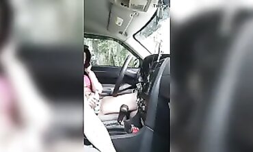 Petite Redhead Masturbates Through Car Window At The Park