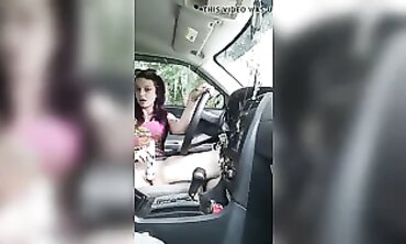 Petite Redhead Masturbates Through Car Window At The Park