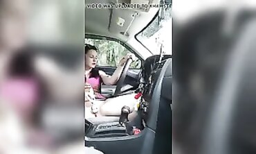 Petite Redhead Masturbates Through Car Window At The Park