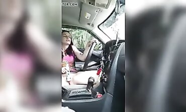 Petite Redhead Masturbates Through Car Window At The Park