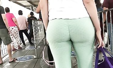 Latina MILF in Green Leggings Waiting at the Bus Stop Part 1