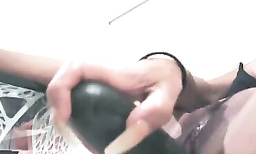 Latina Pleasure Squirts After Cucumber Toying