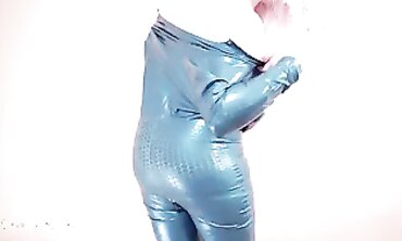 Arya Grander: Busty MILF in Tight Vinyl Catsuit