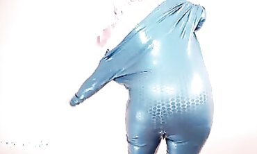 Arya Grander: Busty MILF in Tight Vinyl Catsuit