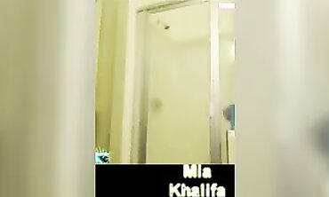 Mia Khalifa Showcases Her Big Tits In A Steamy Public Shower