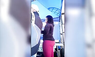 African Guy in Semitransparent Maroon Trousers