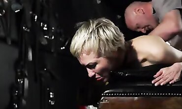 Camera Flashes Submissive Masha Mitten's Face During Rough Anal Spanking