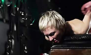Camera Flashes Submissive Masha Mitten's Face During Rough Anal Spanking