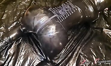 Sex Kitten in Vinyl Cat Suit Fucks Her Way to an Earth Shattering Orgasm