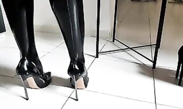 Hot Babe in Vinyl Striptease with Sexy Legs - Teasing You With Her Heels
