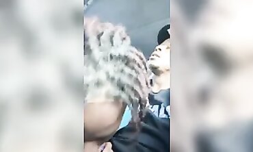 Black Babe Gets Busted Giving a Sloppy Blowjob in the Car