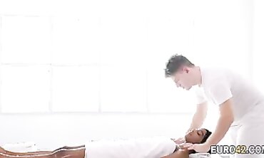 sweetheart ebony pounded on a caresses table by a gigantic schlong