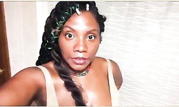 African with ample turgid mounds wrings milk out