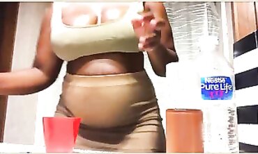 African with ample turgid mounds wrings milk out