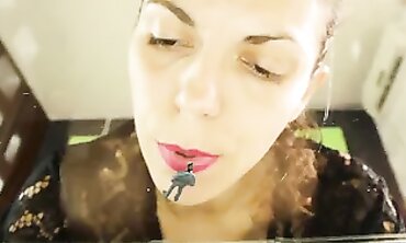 Giantess Julia V Earth is slurping diminutive fellow