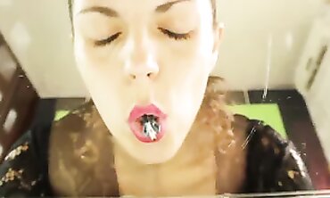 Giantess Julia V Earth is slurping diminutive fellow