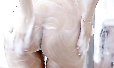 Curvy MILF Busts Out In A Steamy Shower Scene